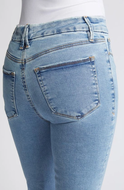 Shop Good American Good Legs Crop Bootcut Jeans In Blue