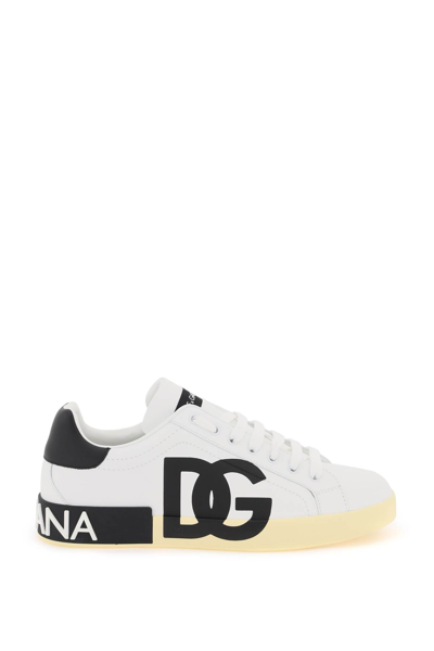 Shop Dolce & Gabbana Leather Portofino Sneakers With Dg Logo In Bianco Nero (white)