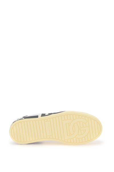 Shop Dolce & Gabbana Leather Portofino Sneakers With Dg Logo In Bianco Nero (white)