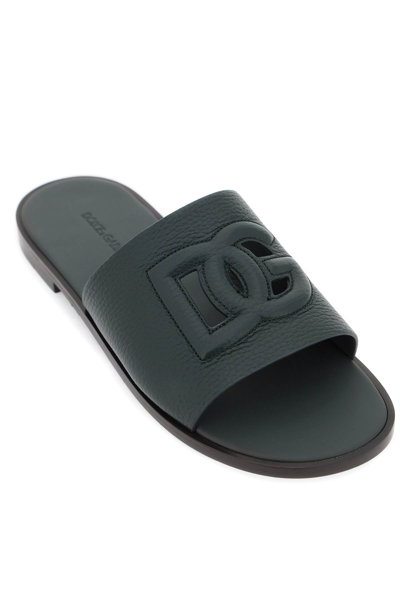 Shop Dolce & Gabbana Cut-out Logo Leather Slides In Verde Scuro 3 (green)