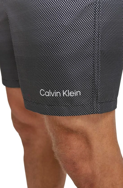 Shop Calvin Klein Volley Core Gradient Dot Swim Trunks In Black