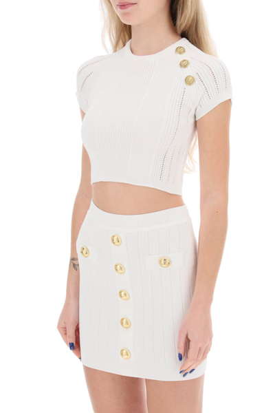 Shop Balmain Knitted Cropped Top With Embossed Buttons In Blanc (white)