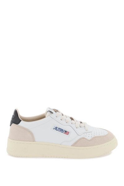 Shop Autry Leather Medalist Low Sneakers In White Black (beige)