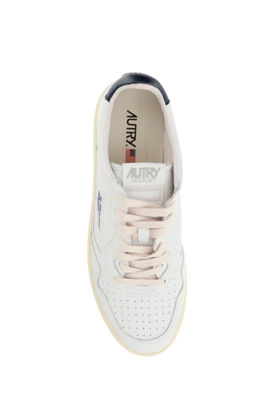 Shop Autry Leather Medalist Low Sneakers In White Space (white)