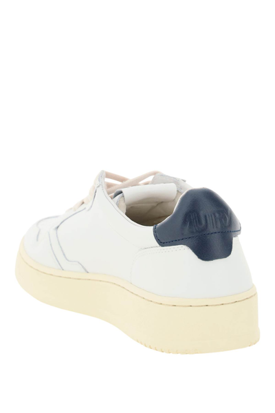 Shop Autry Leather Medalist Low Sneakers In White Space (white)