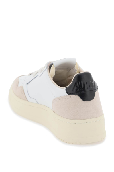 Shop Autry Leather Medalist Low Sneakers In White Black (beige)