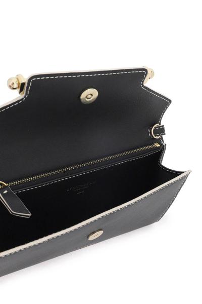 Shop Strathberry Multress Mini Crossbody Bag In Black Vanilla Edge Stitch (black)