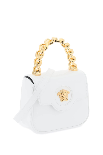 Shop Versace Patent Leather La Medusa Mini Bag In Optical White  Gol (white)