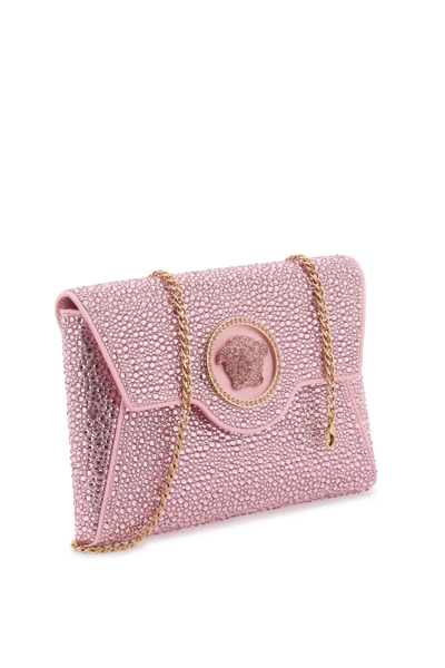Shop Versace La Medusa Envelope Clutch With Crystals In Pale Pink  Gold (pink)