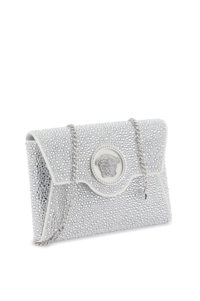 Shop Versace La Medusa Envelope Clutch With Crystals In Optical White Palladium (silver)