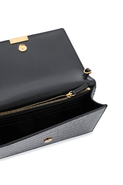 Shop Versace Croco-embossed Leather Greca Goddes Crossbody Bag In Black  Gold (black)