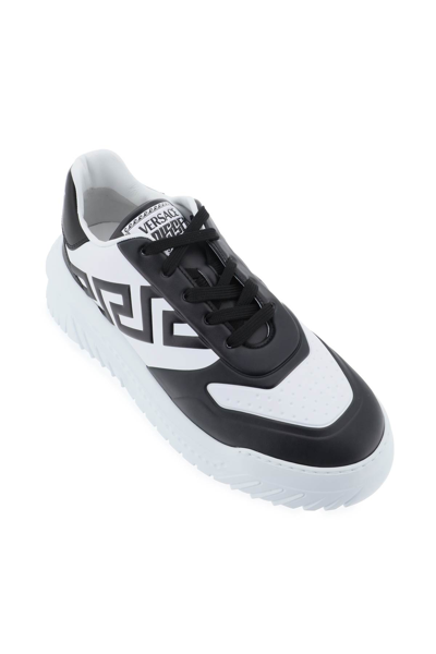 Shop Versace Odissea Sneakers In Black White (white)