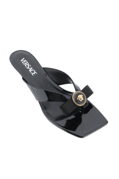 Shop Versace Gianni Ribbon Thong Mules In Black  Gold (black)