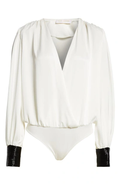 Shop Ramy Brook Selena Wrap Front Sequin Cuff Bodysuit In Ivory
