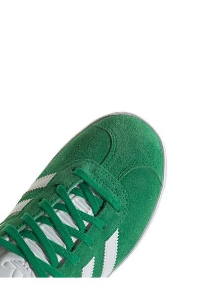 Shop Adidas Originals Kids' Gazelle Low Top Sneaker In Green/ White/ Gold