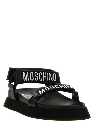 Shop Moschino Logo Sandals Black