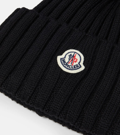 Shop Moncler Ribbed-knit Wool Beanie In Black