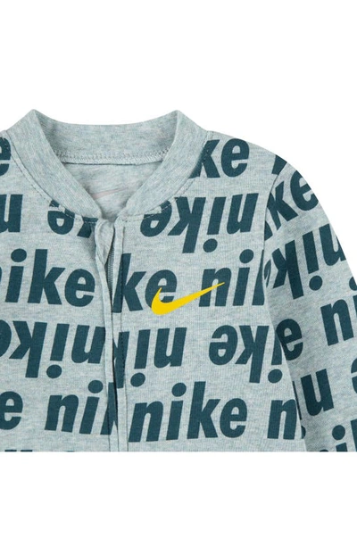 Shop Nike Allover Logo Print Footie In Geode Teal Heather