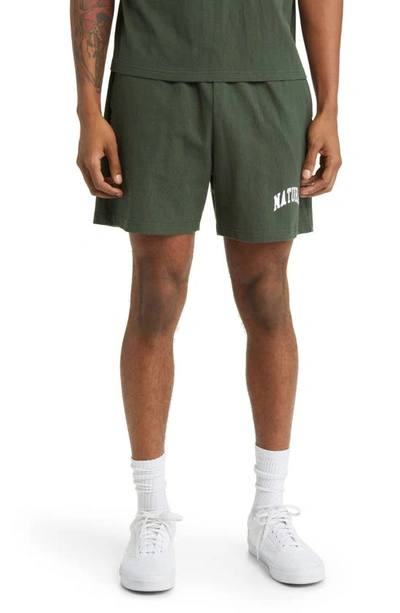 Shop Museum Of Peace And Quiet Natural Graphic Sweat Shorts In Forest