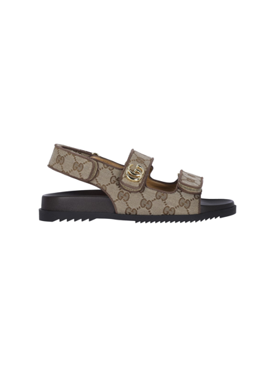 Shop Gucci 'gg' Sandals In Brown