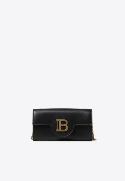 Shop Balmain B-buzz Calf Leather Clutch In Black