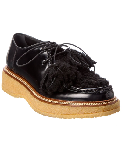 Shop Tod's Fringed Patent Platform Loafer In Black