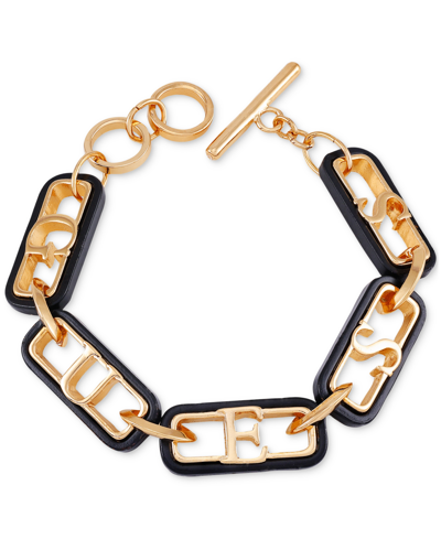 Shop Guess Gold-tone Color Oval Link Logo Flex Bracelet