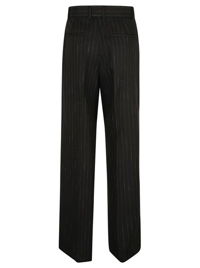 Shop Msgm Pinstripe-pattern Wide-leg Trousers In Black