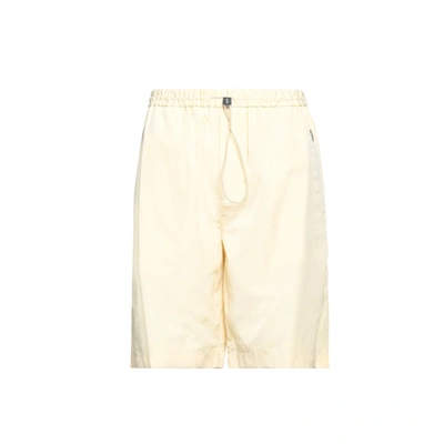Shop Jil Sander Shorts In Yellow