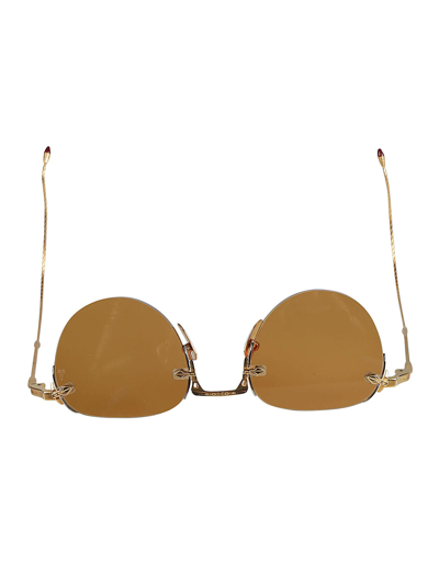 Shop Jacques Marie Mage Rimless Sunglasses In Gold