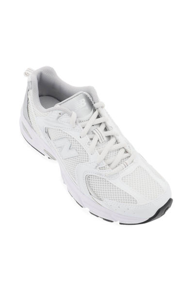 Shop New Balance 530 Sneakers In White Silver (silver)
