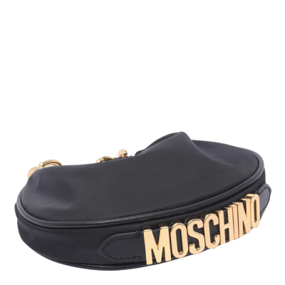 Shop Moschino Lettering Logo Handbag In Black
