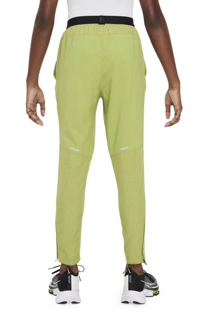 Shop Nike Kids' Dri-fit Multi Tech Pants In Pear/ Black
