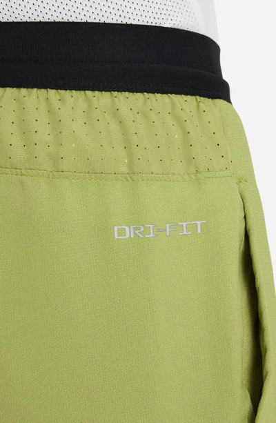 Shop Nike Kids' Dri-fit Multi Tech Pants In Pear/ Black