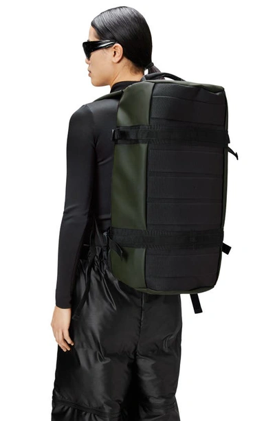 Shop Rains Small Texel Waterproof Duffle Backpack In Green