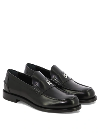 Shop Givenchy "mr G" Loafers In Black