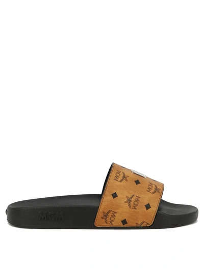 Shop Mcm Monogram Print Rubber Sandals In Brown
