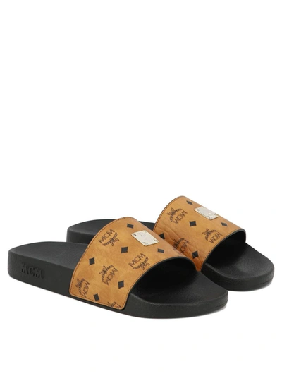 Shop Mcm Monogram Print Rubber Sandals In Brown