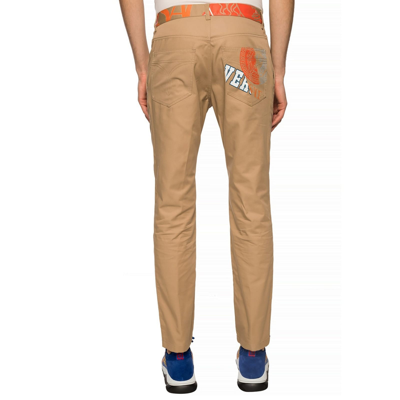 Shop Versace Compilation Chino Trousers In Beige