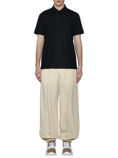 Shop Burberry Pants In Soap
