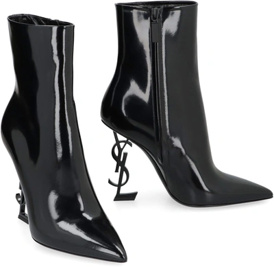 Shop Saint Laurent Opyum Leather Ankle Boots In Black