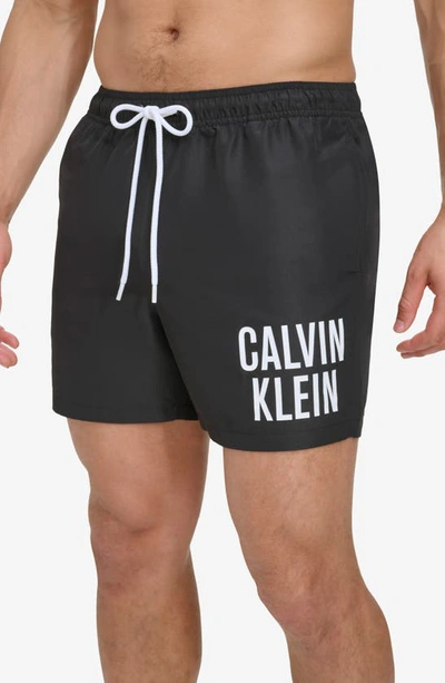 Shop Calvin Klein Modern Euro Upf 40+ Swim Trunks In Black