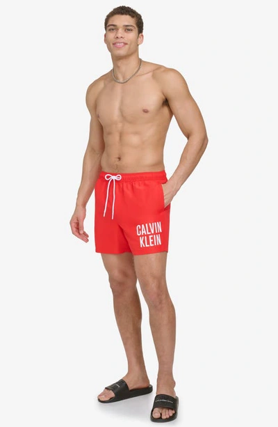 Shop Calvin Klein Modern Euro Upf 40+ Swim Trunks In Red