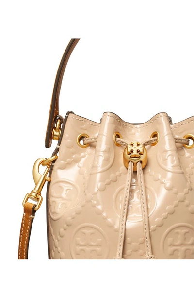 Shop Tory Burch Mini T Monogram Embossed Patent Leather Bucket Bag In Warm Chai