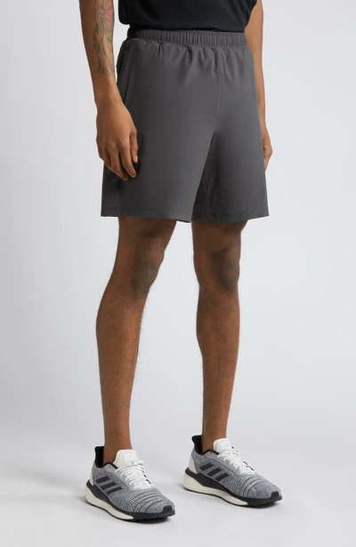 Shop Beyond Yoga Pivotal Lined Stretch Shorts In Graphite