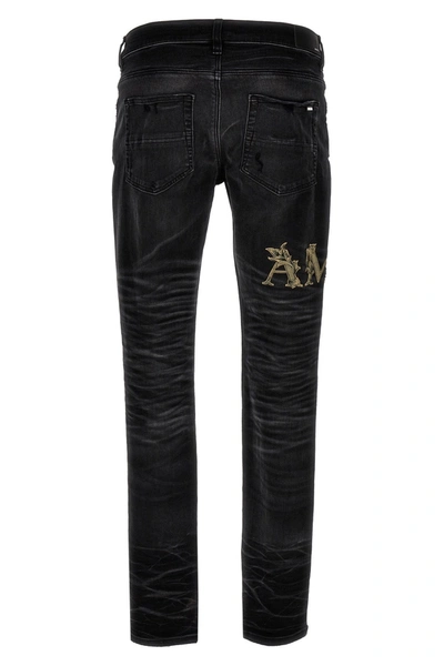 Shop Amiri Men 'baroque Logo' Jeans In Black