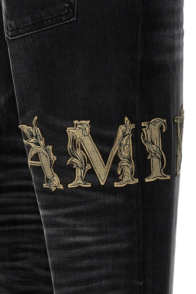 Shop Amiri Men 'baroque Logo' Jeans In Black