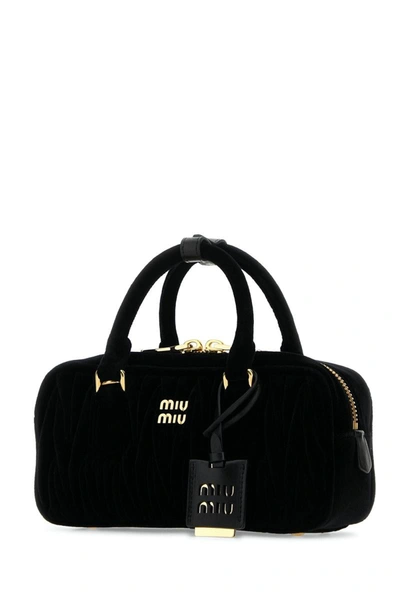 Shop Miu Miu Handbags. In Black