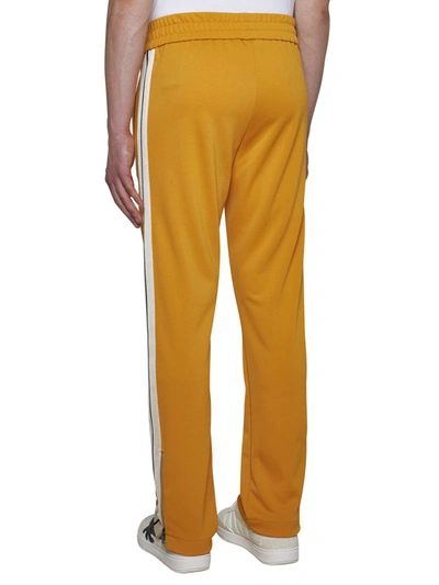 Shop Palm Angels Trousers In Orange Off White