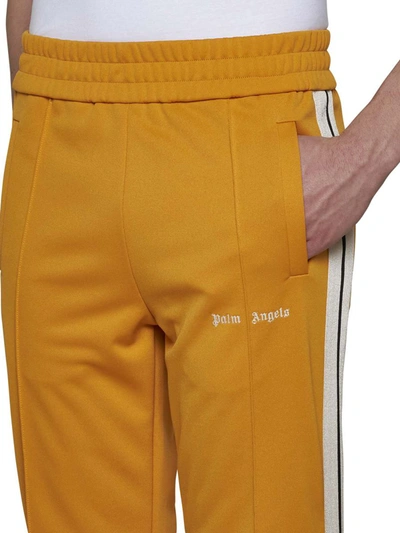 Shop Palm Angels Trousers In Orange Off White